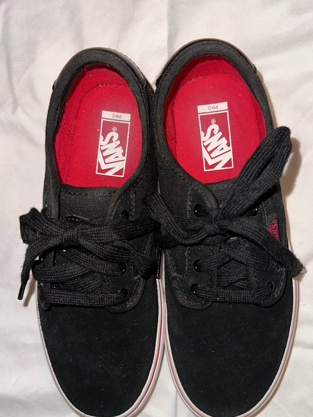 Vans Youth Black Low-Top Sneakers with Red Insole